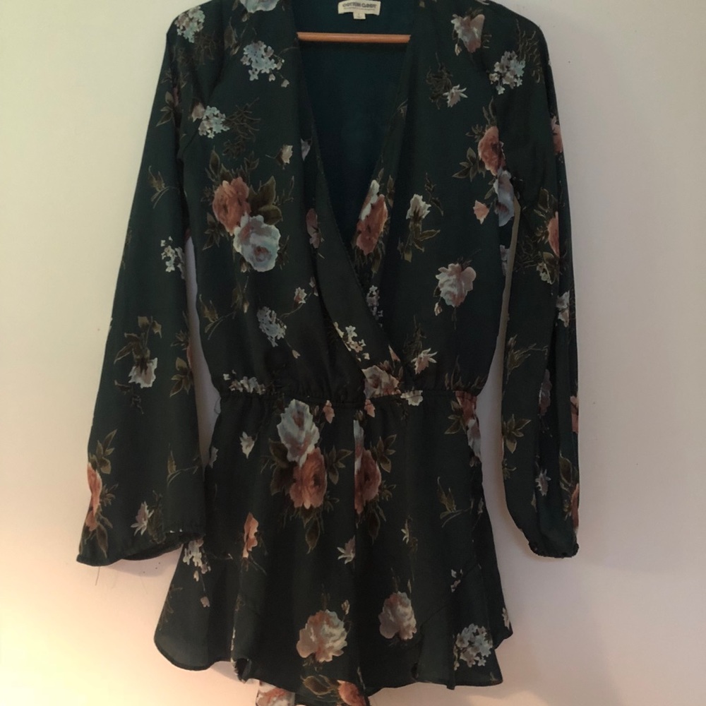 Floral olive green romper with deep V neckline